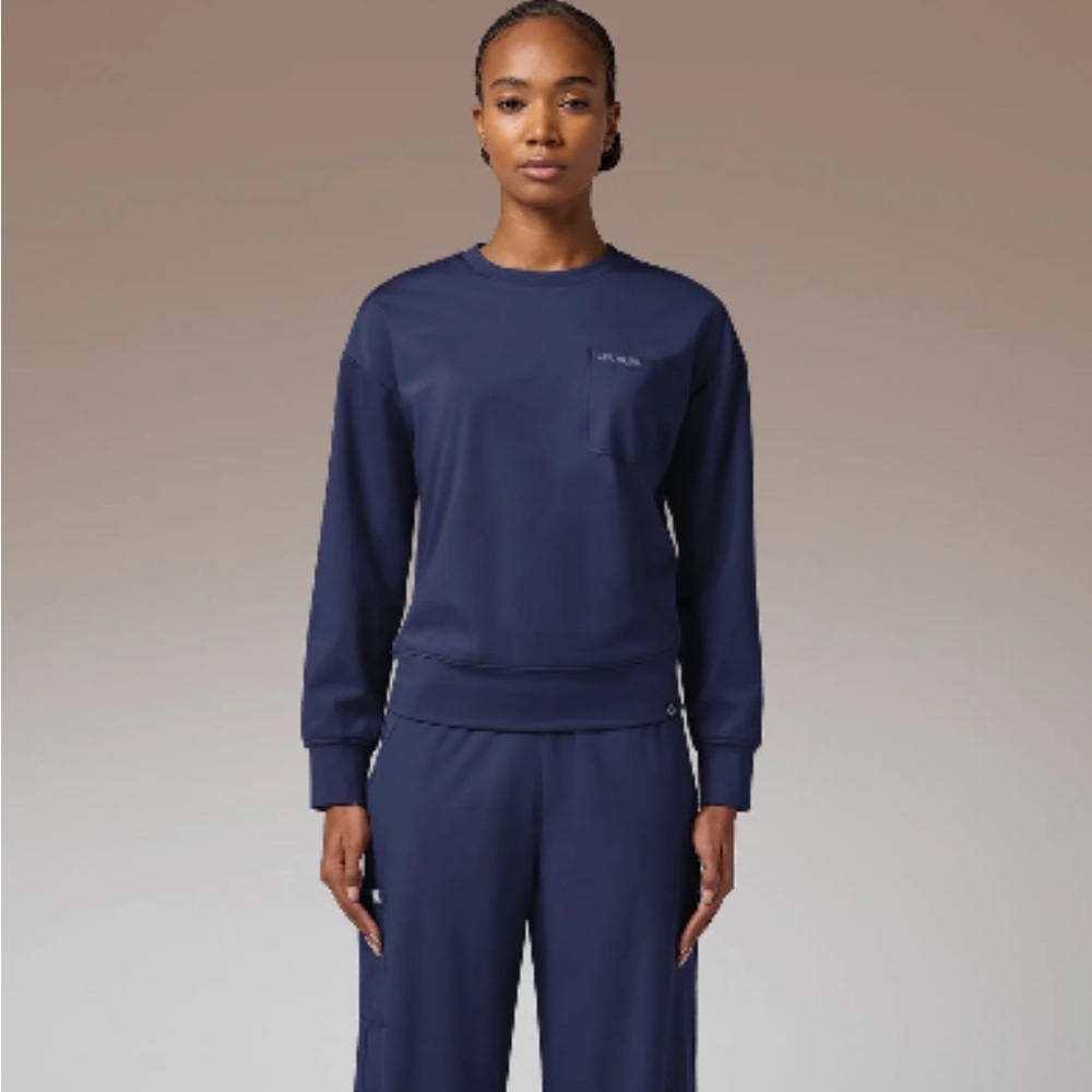 HYPOTHESIS OMNI BASE PULLOVER
WOMEN'S KNIT CREW NECK SCRUB PULLOVER
NWT SMALL - Picture 5 of 6